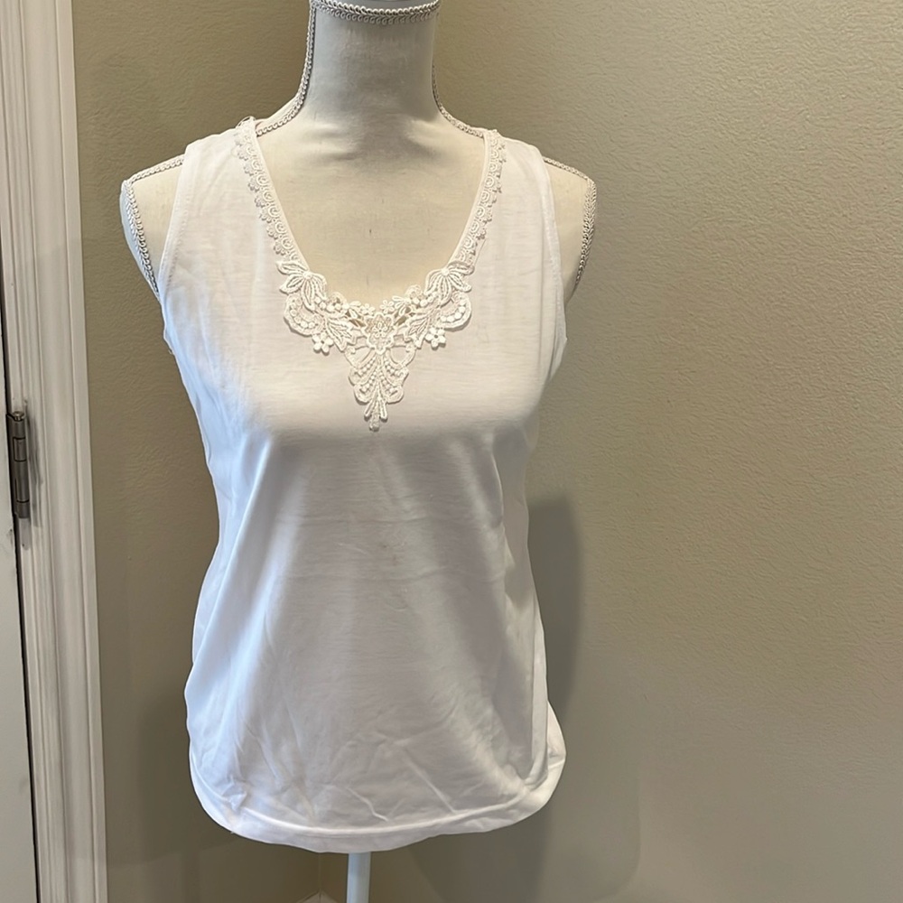 Winter white camisole with lace trim at neck Small poly/cotton tiny spot on back